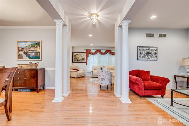 35 Fabiszewski Way, Parlin, NJ 08859 - entrance foyer featuring ornate columns, baseboards, light wood-style floors, ornamental molding, and recessed lighting