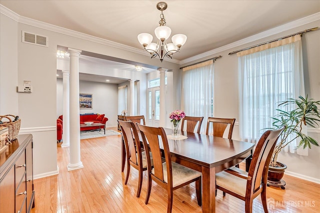 35 Fabiszewski Way, Parlin, NJ 08859 - dining area with ornate columns, light wood-style floors, ornamental molding, and baseboards