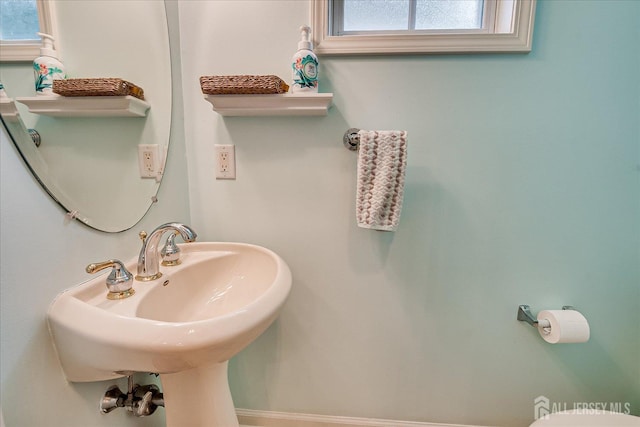 35 Fabiszewski Way, Parlin, NJ 08859 - half bath featuring plenty of natural light, a sink, and toilet