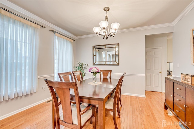 35 Fabiszewski Way, Parlin, NJ 08859 - dining area with light wood-type flooring, a chandelier, ornamental molding, and baseboards