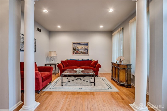 35 Fabiszewski Way, Parlin, NJ 08859 - living area with ornate columns, wood-type flooring, recessed lighting, and baseboards