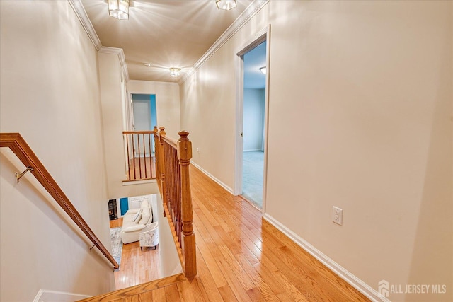 35 Fabiszewski Way, Parlin, NJ 08859 - hall featuring an upstairs landing, light wood-style flooring, ornamental molding, and baseboards