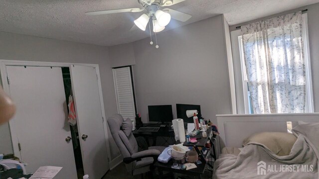 810-814 Leland Ave, Plainfield, NJ 07062 - bedroom featuring a textured ceiling, an office area, and ceiling fan