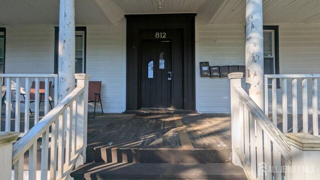 810-814 Leland Ave, Plainfield, NJ 07062 - doorway to property with a porch