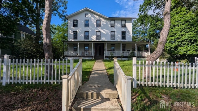 810-814 Leland Ave, Plainfield, NJ 07062 - view of front of home with covered porch and a fenced front yard