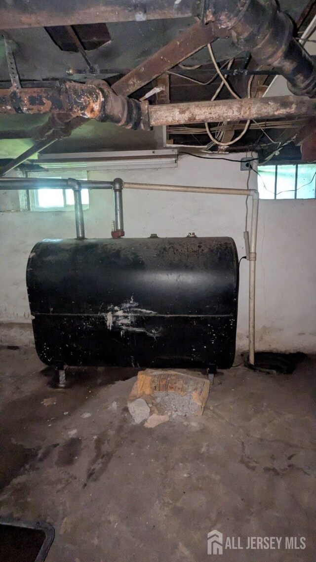 810-814 Leland Ave, Plainfield, NJ 07062 - basement view of oil tank and concrete flooring