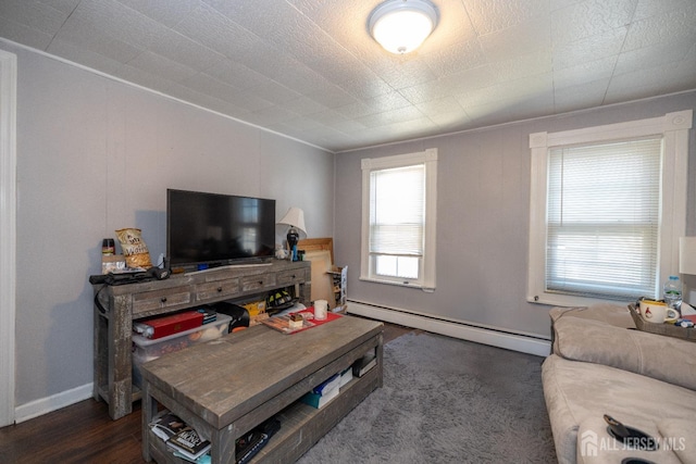 58 Smullen St, Sayreville, NJ 08872 - living area with baseboard heating and dark wood-type flooring