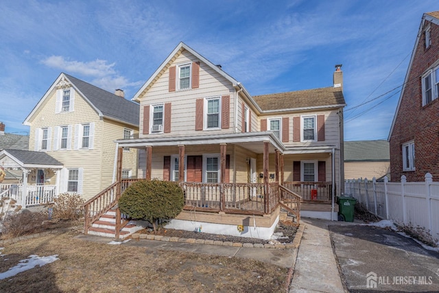 58 Smullen St, Sayreville, NJ 08872 - view of front of property with covered porch, a chimney, and fence