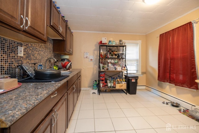 58 Smullen St, Sayreville, NJ 08872 - kitchen featuring baseboards, light tile patterned floors, backsplash, and crown molding