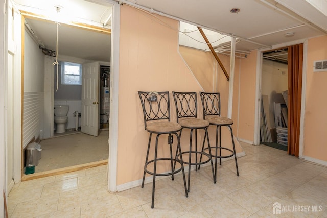 58 Smullen St, Sayreville, NJ 08872 - below grade area with visible vents and secured water heater
