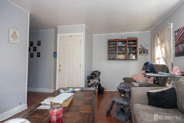 58 Smullen St, Sayreville, NJ 08872 - living room featuring baseboards, ornamental molding, and wood finished floors