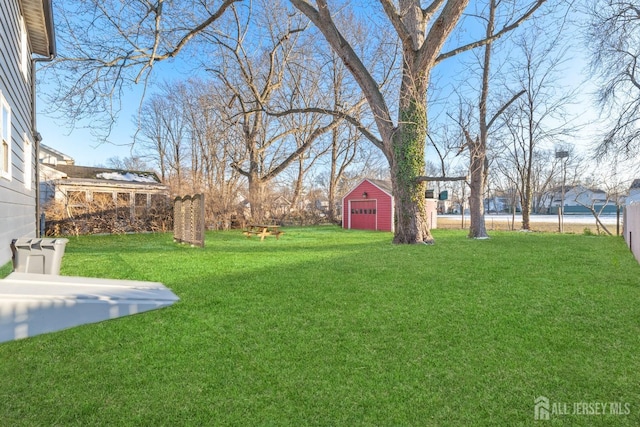 view of yard with a storage unit and an outdoor structure