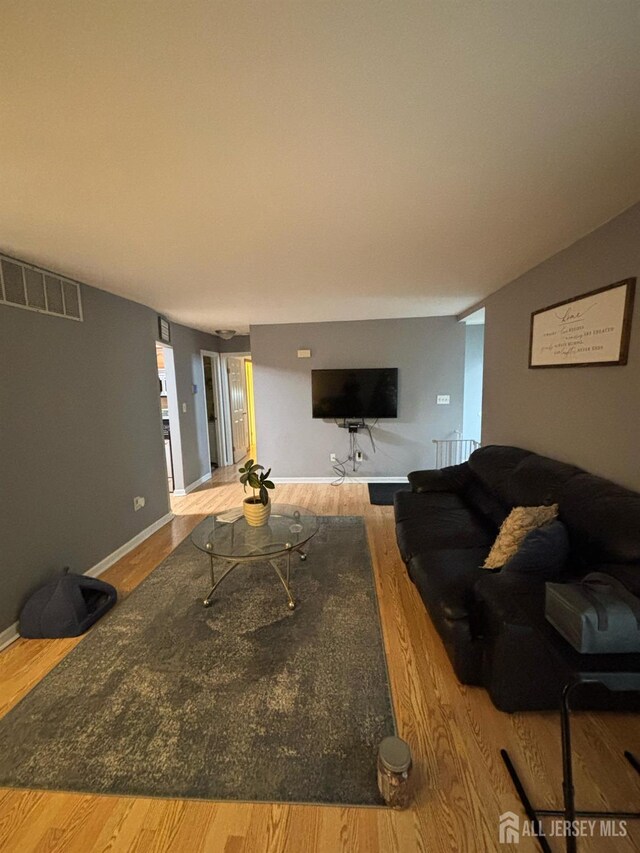 101 Michaels Ct, Woodbridge Proper, NJ 07095 - living area with wood finished floors