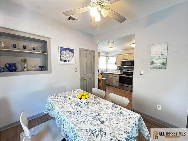 133 Pleasant Ave, Iselin, NJ 08830 - dining space featuring dark wood-style floors, ceiling fan, and baseboards