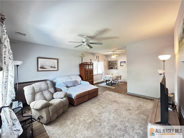 133 Pleasant Ave, Iselin, NJ 08830 - living area with wood finished floors, a ceiling fan, and baseboards