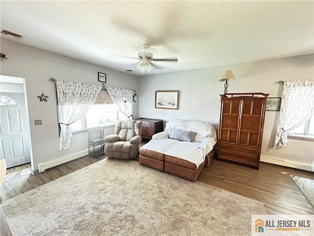 133 Pleasant Ave, Iselin, NJ 08830 - living room featuring healthy amount of natural light, baseboards, and wood finished floors