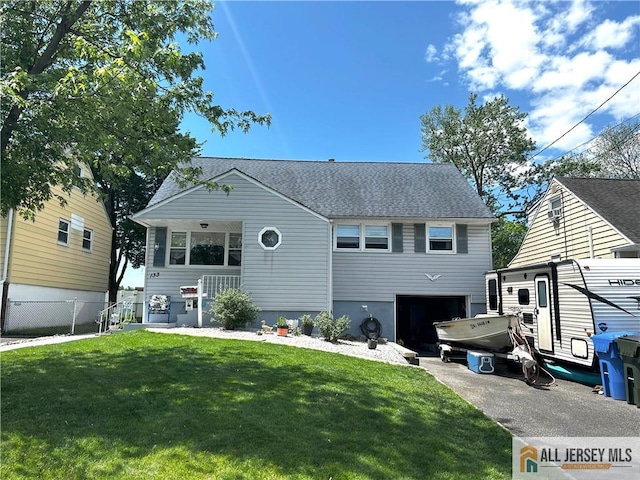 133 Pleasant Ave, Iselin, NJ 08830 - view of front of property with driveway, an attached garage, and a shingled roof