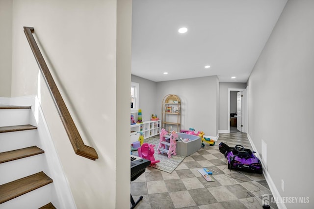 game room featuring recessed lighting and baseboards