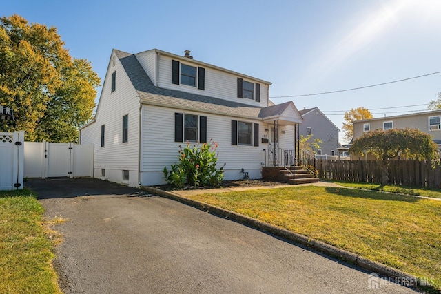 view of front of home with a front lawn