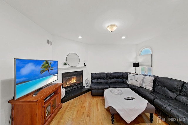248 N 17th St N, Kenilworth, NJ 07033 - living room with a glass covered fireplace, light wood finished floors, and recessed lighting