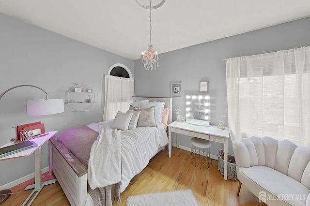 248 N 17th St N, Kenilworth, NJ 07033 - bedroom featuring a chandelier and wood finished floors