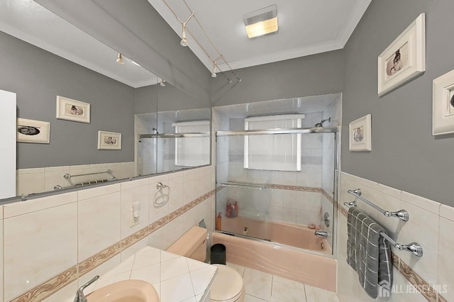 248 N 17th St N, Kenilworth, NJ 07033 - full bath with tile walls, combined bath / shower with glass door, vanity, tile patterned flooring, and a wainscoted wall