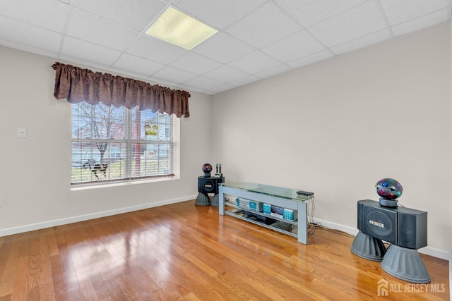 1 Kushnetki Rd, Parlin, NJ 08859 - empty room with wood finished floors and a paneled ceiling