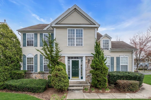 1 Kushnetki Rd, Parlin, NJ 08859 - view of front of property with stone siding and roof with shingles