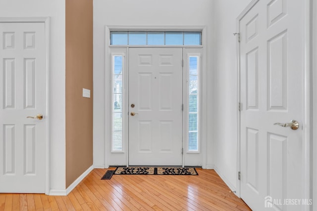 1 Kushnetki Rd, Parlin, NJ 08859 - entryway with hardwood / wood-style flooring and baseboards