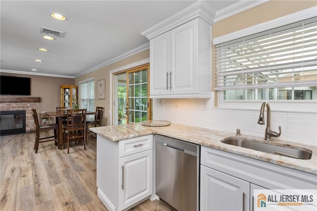 2 Belmar Rd Unit C, Monroe, NJ 08831 - kitchen with dishwasher, a sink, ornamental molding, white cabinetry, and tasteful backsplash