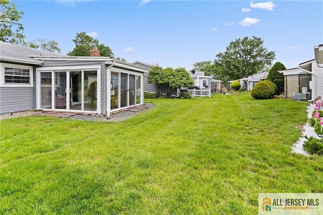 2 Belmar Rd Unit C, Monroe, NJ 08831 - view of green lawn with a sunroom