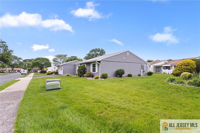2 Belmar Rd Unit C, Monroe, NJ 08831 - view of property exterior with a yard
