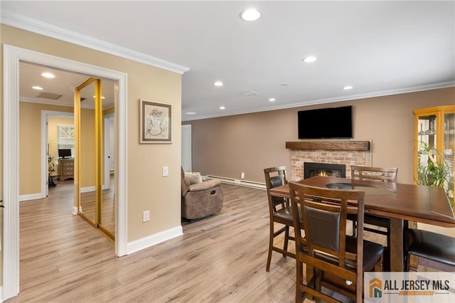 2 Belmar Rd Unit C, Monroe, NJ 08831 - dining space with recessed lighting, ornamental molding, light wood-type flooring, baseboards, and a brick fireplace
