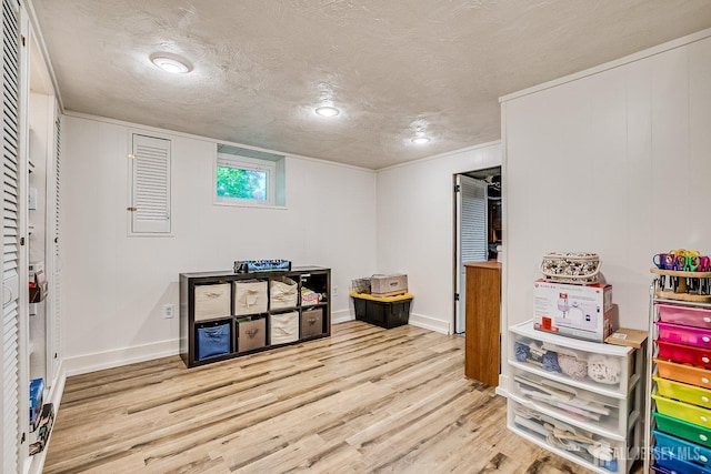 108 Morris Ave, Edison, NJ 08837 - rec room with wood finished floors and a textured ceiling