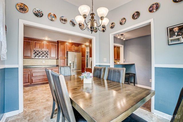 108 Morris Ave, Edison, NJ 08837 - dining area featuring a chandelier and baseboards