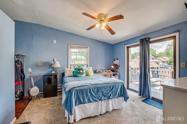 108 Morris Ave, Edison, NJ 08837 - carpeted bedroom with vaulted ceiling, access to outside, a ceiling fan, and a baseboard heating unit