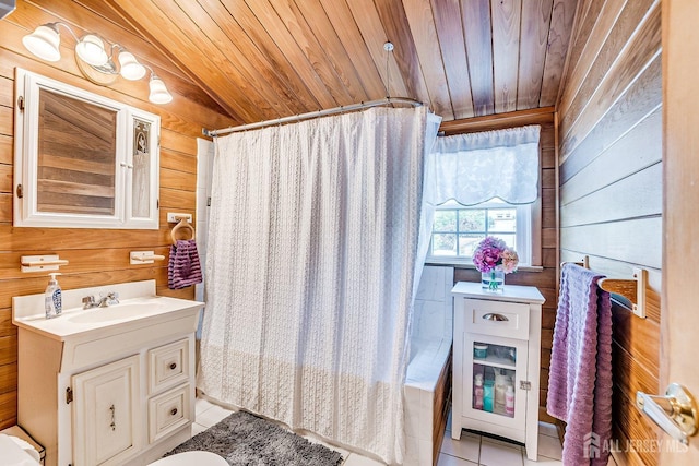 108 Morris Ave, Edison, NJ 08837 - bathroom with wood ceiling, wooden walls, tile patterned flooring, vanity, and shower / bath combo