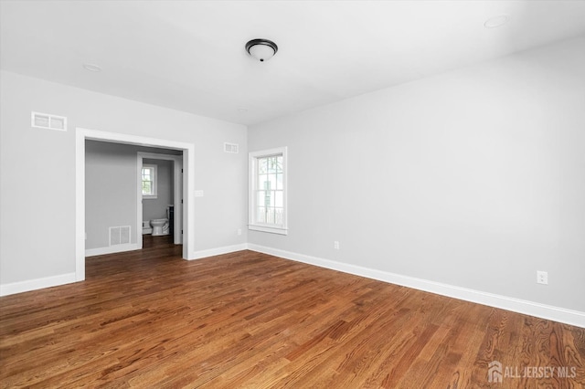 440 Ellisdale Rd, Chesterfield, NJ 08515 - empty room featuring baseboards, wood finished floors, and visible vents