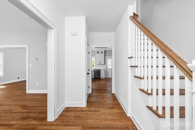 440 Ellisdale Rd, Chesterfield, NJ 08515 - corridor featuring baseboards, stairs, and wood finished floors