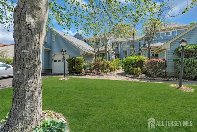 view of yard with an attached garage