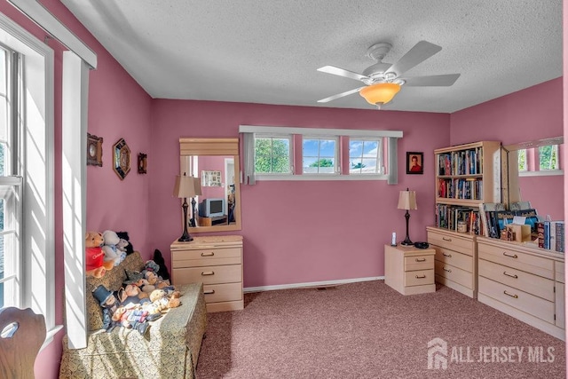 36 Canterbury Dr Unit D, Monroe, NJ 08831 - carpeted bedroom with a textured ceiling and a ceiling fan
