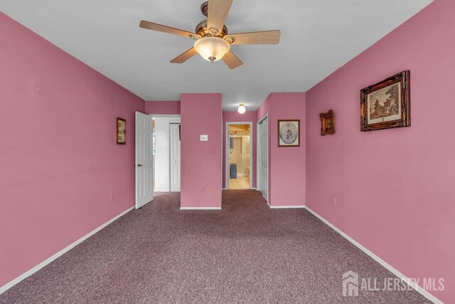 36 Canterbury Dr Unit D, Monroe, NJ 08831 - carpeted spare room with ceiling fan and baseboards
