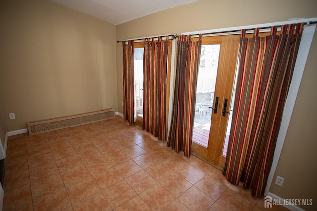 51 Shadyside Ave, Old Bridge, NJ 08879 - unfurnished room featuring light tile patterned floors, baseboards, and baseboard heating