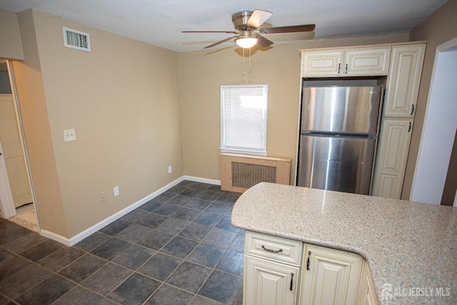 51 Shadyside Ave, Old Bridge, NJ 08879 - kitchen featuring visible vents, freestanding refrigerator, radiator, baseboards, and ceiling fan