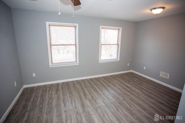 51 Shadyside Ave, Old Bridge, NJ 08879 - spare room with baseboards, a ceiling fan, dark wood-style flooring, and visible vents