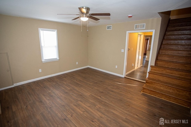 51 Shadyside Ave, Old Bridge, NJ 08879 - unfurnished room with stairs, dark wood-style flooring, ceiling fan, and visible vents