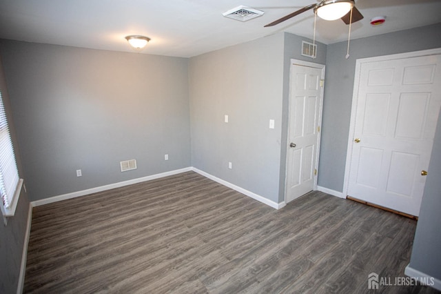 51 Shadyside Ave, Old Bridge, NJ 08879 - spare room with dark wood-style flooring, a ceiling fan, visible vents, and baseboards