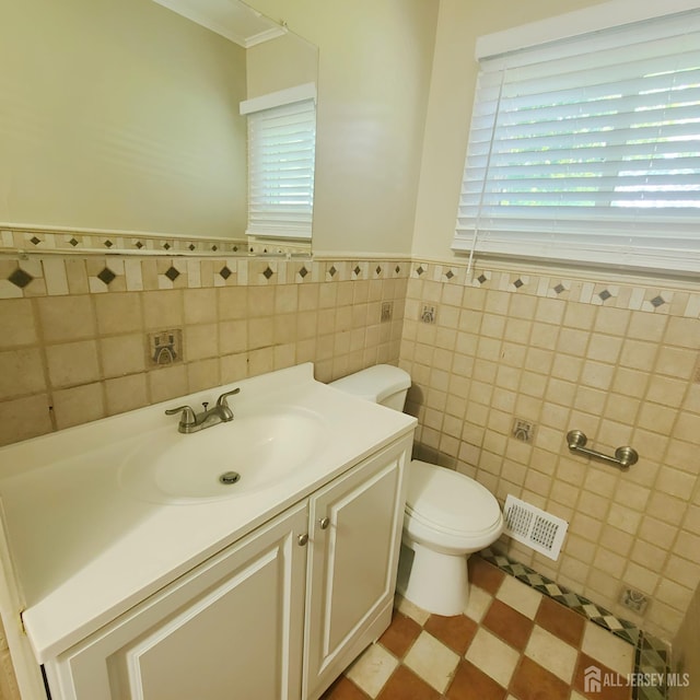 15 Clemson St, Old Bridge, NJ 08859 - bathroom with tile walls, vanity, crown molding, and a wainscoted wall