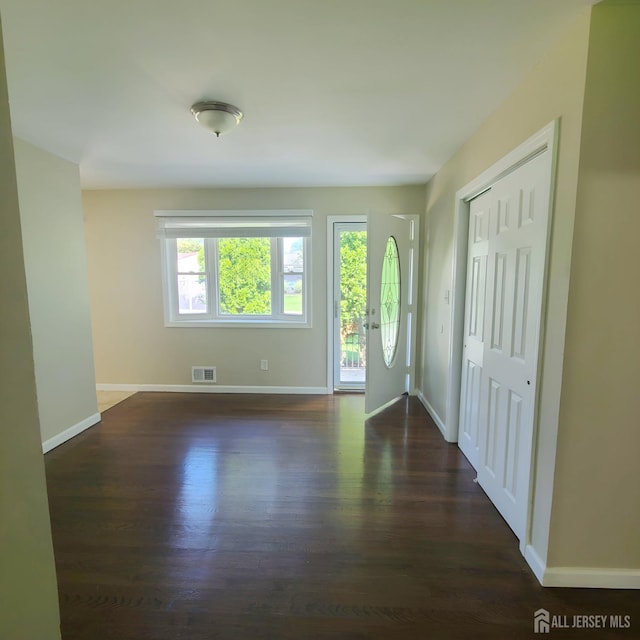 15 Clemson St, Old Bridge, NJ 08859 - entryway featuring dark wood-type flooring and baseboards