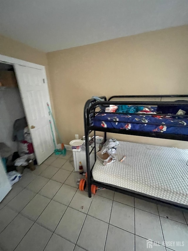 142 Joyce Kilmer Ave, New Brunswick, NJ 08901 - bedroom with tile patterned floors